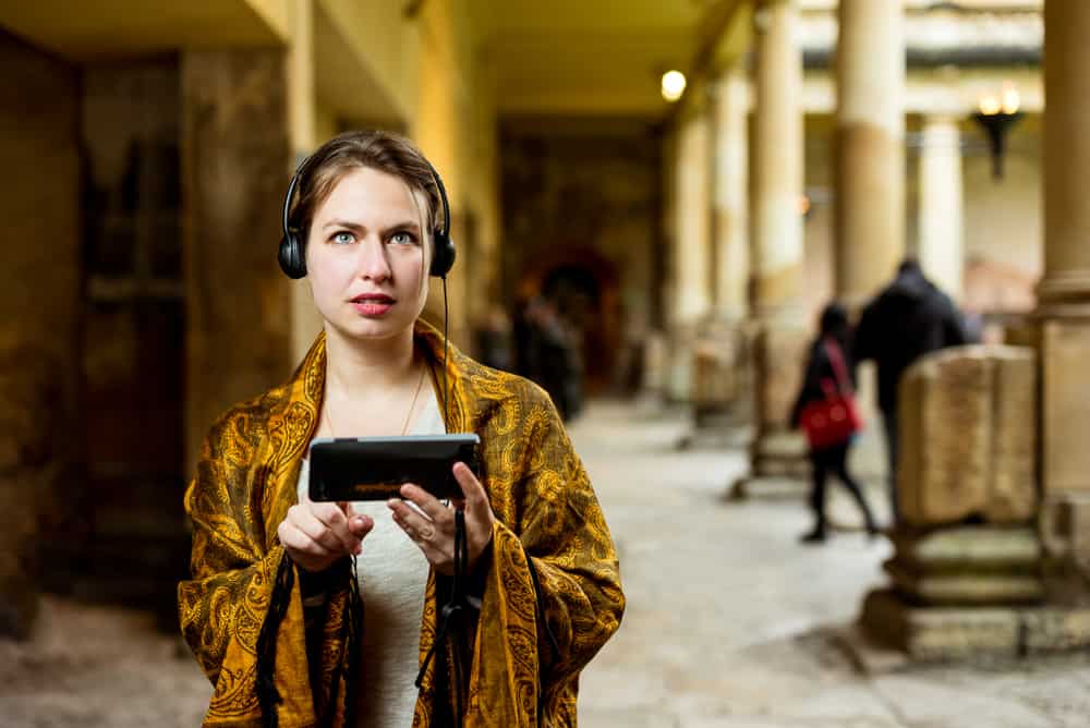 Advertising photography with model demonstrating device.