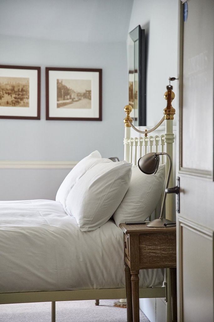 Knowing when not to add extra light to a shot is just as important as knowing how to. This guest room photography uses natural light to capture the ambience of the room.